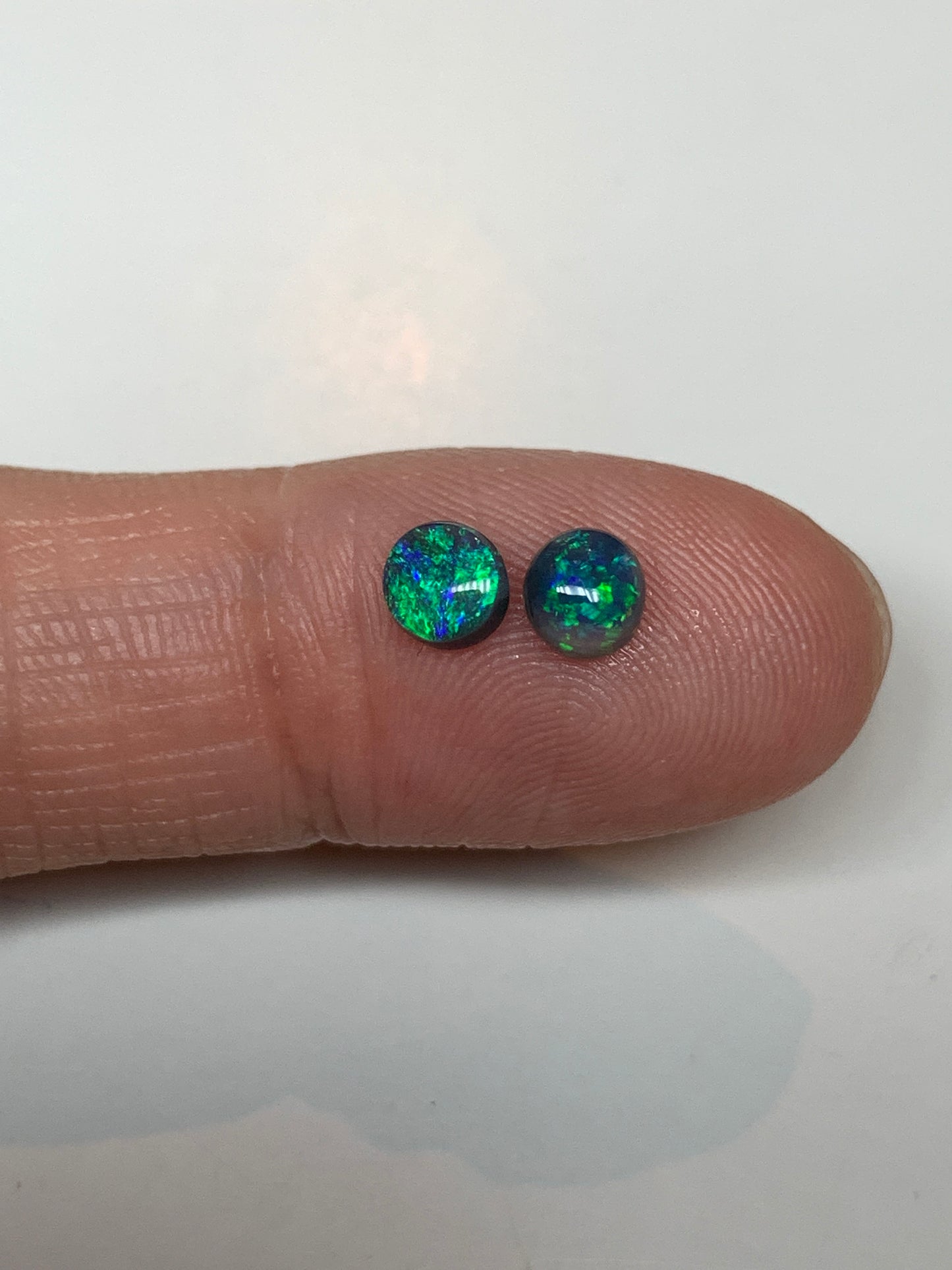 High Brilliance. Lightning Ridge Black Opal Pair. 0.62 Ct