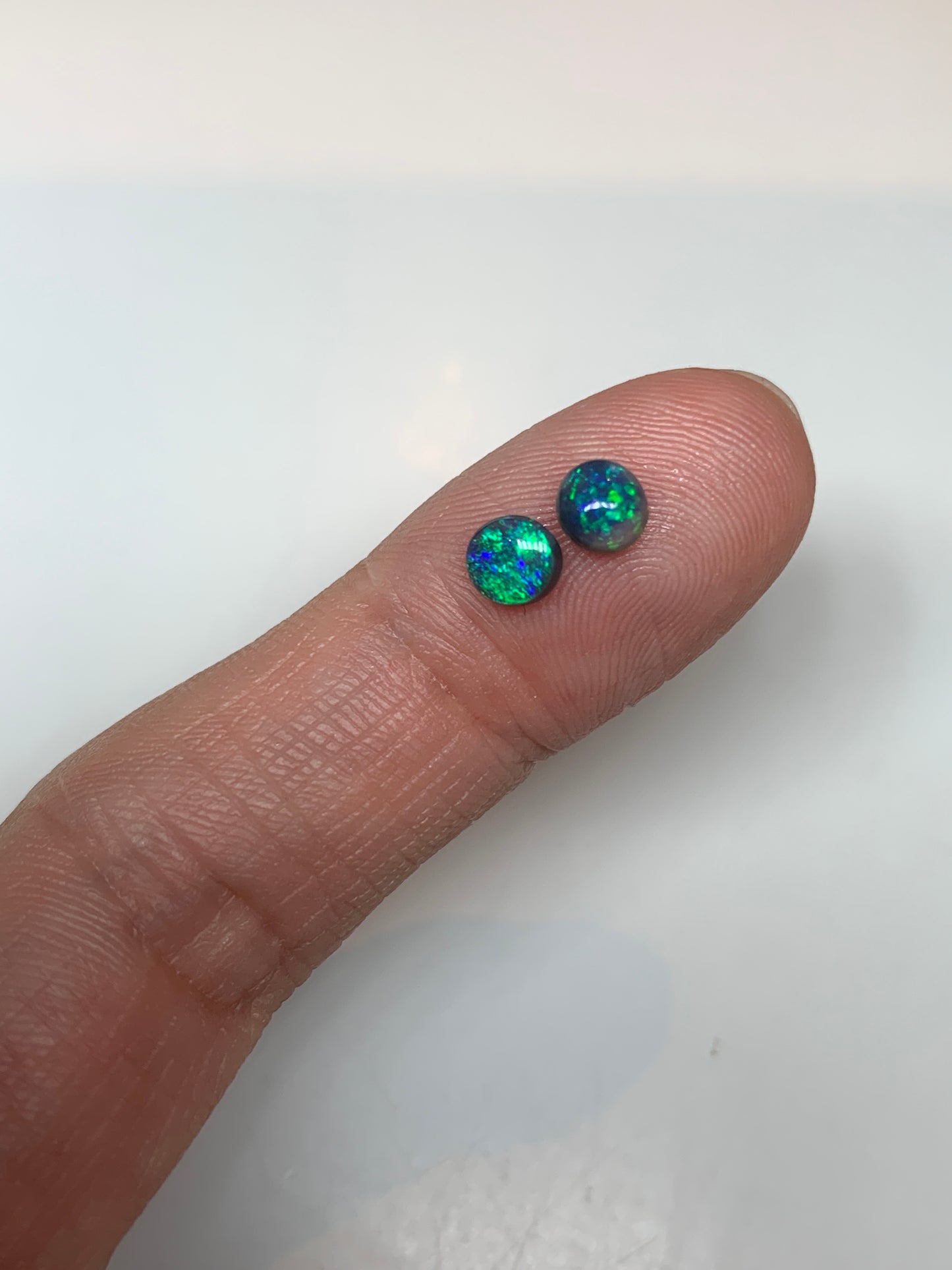 High Brilliance. Lightning Ridge Black Opal Pair. 0.62 Ct