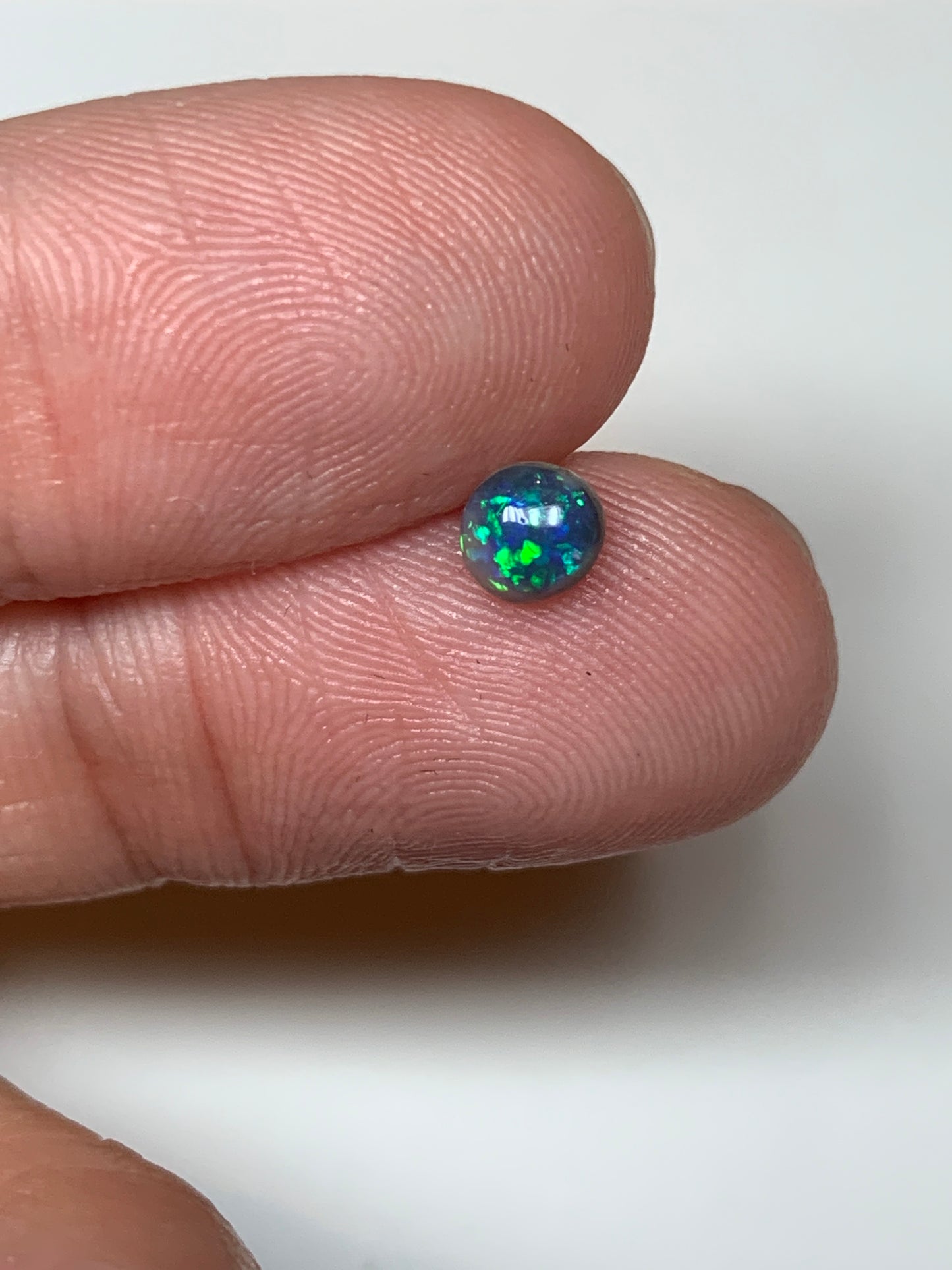 High Brilliance. Lightning Ridge Black Opal Pair. 0.62 Ct
